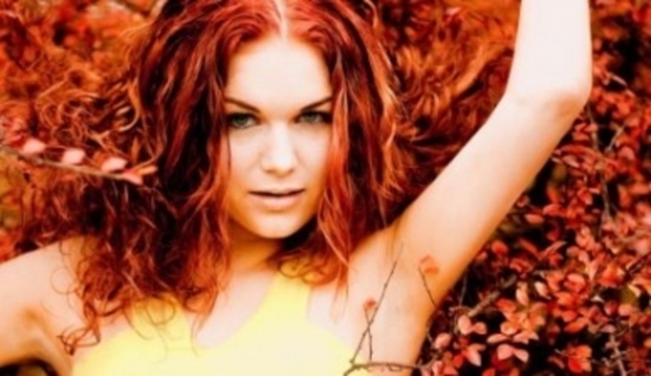 Fotografie rusovlasé ženy