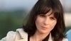 Juilette Binoche se zamyšleným pohledem