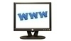 Fotografie monitoru s logem www na ploše