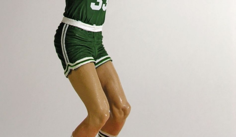 Muž v zeleném sportovním oblečení