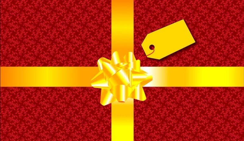 Foto červené krabice se žlutou mašlí