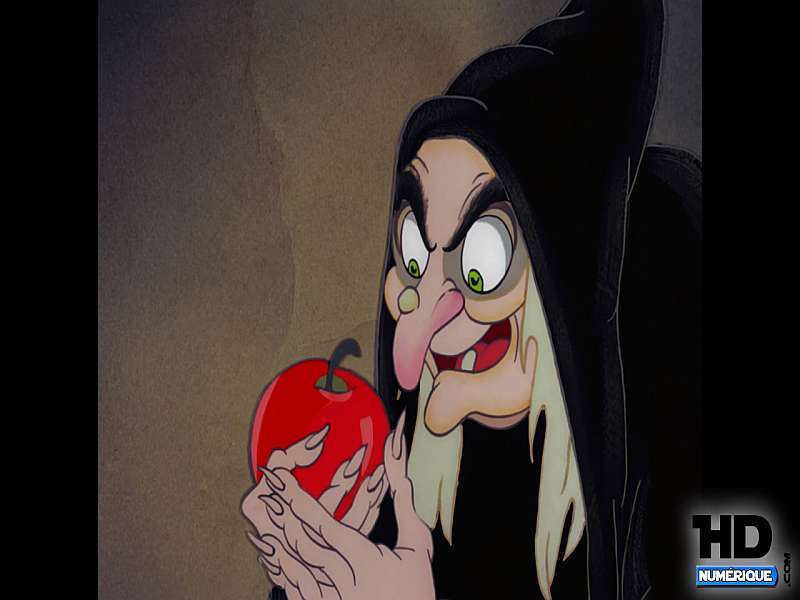 Kreslená ježibaba s jablkem